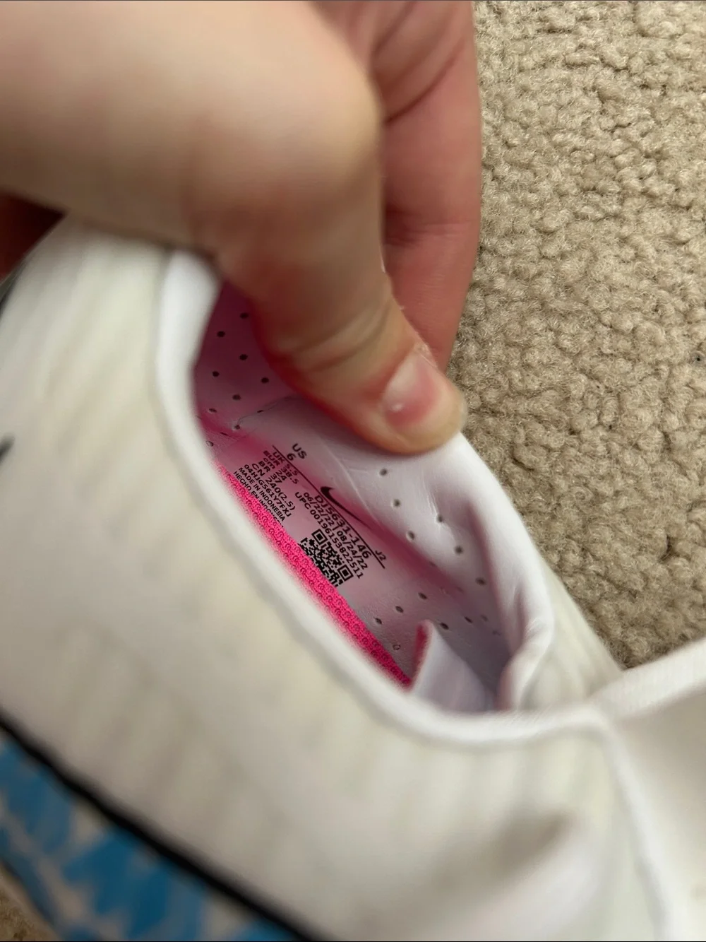 Nike Women's White Soccer Cleats with Blue Graphics and Pink Insole